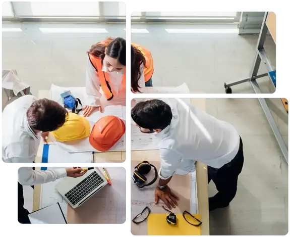 Four people in hard hats working at a table in an industry setting.